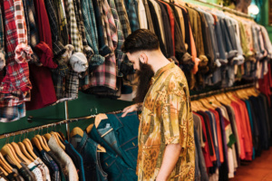 man buying vintage clothes